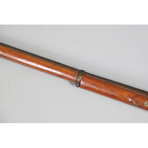 34 - AN 1856 PATTERN PERCUSSION FIRING RIFLE. With a 90 cm barrel with two band fixings, indistict  stamp... 