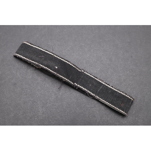 340 - A SECOND WORLD WAR WAFFEN-SS 'KURT EGGERS' CUFFBAND. A Waffen-SS 'Kurt Eggers' cuffband. RZM type in... 