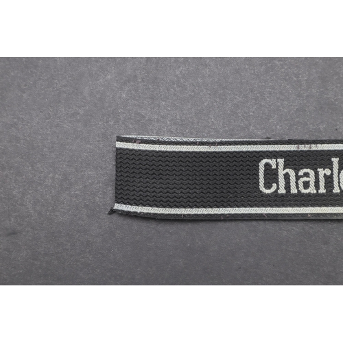 341 - A SECOND WORLD WAR WAFFEN-SS 'CHARLEMAGNE' CUFFBAND. A Waffen-SS 'Charlemagne' cuffband. Bevo type m... 