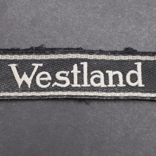 342 - A SECOND WORLD WAR WAFFEN-SS 'WESTLAND' CUFFBAND. A Waffen-SS 'Westland' cuffband. RZM type machine ... 