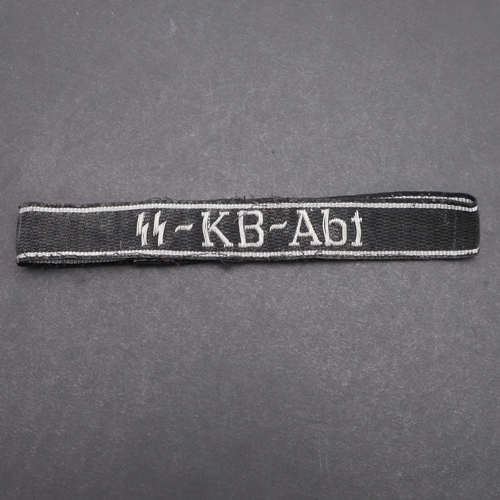 344 - A SECOND WORLD WAR WAFFEN-SS OFFICER'S 'SS-KB-ABT' CUFFBAND. A Waffen-SS 'SS-KB-Abt' cuffband. Offic... 