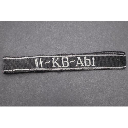 344 - A SECOND WORLD WAR WAFFEN-SS OFFICER'S 'SS-KB-ABT' CUFFBAND. A Waffen-SS 'SS-KB-Abt' cuffband. Offic... 