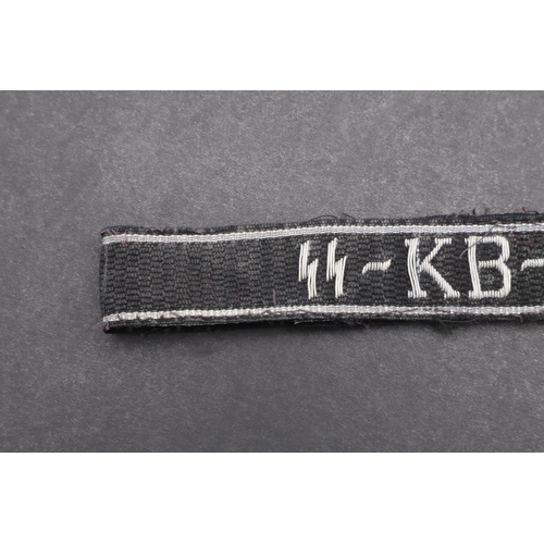 344 - A SECOND WORLD WAR WAFFEN-SS OFFICER'S 'SS-KB-ABT' CUFFBAND. A Waffen-SS 'SS-KB-Abt' cuffband. Offic... 