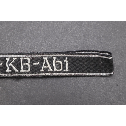 344 - A SECOND WORLD WAR WAFFEN-SS OFFICER'S 'SS-KB-ABT' CUFFBAND. A Waffen-SS 'SS-KB-Abt' cuffband. Offic... 