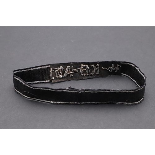 344 - A SECOND WORLD WAR WAFFEN-SS OFFICER'S 'SS-KB-ABT' CUFFBAND. A Waffen-SS 'SS-KB-Abt' cuffband. Offic... 