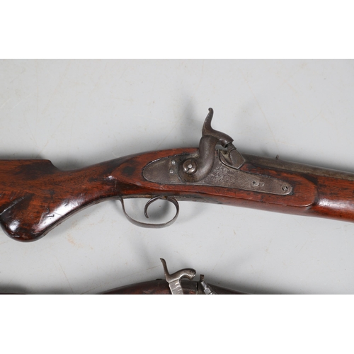 36 - A 19TH CENTURY ENFIELD TYPE PERCUSSION FIRING RIFLE AND ANOTHER SIMILAR. With a 97 cm unmarked barre... 