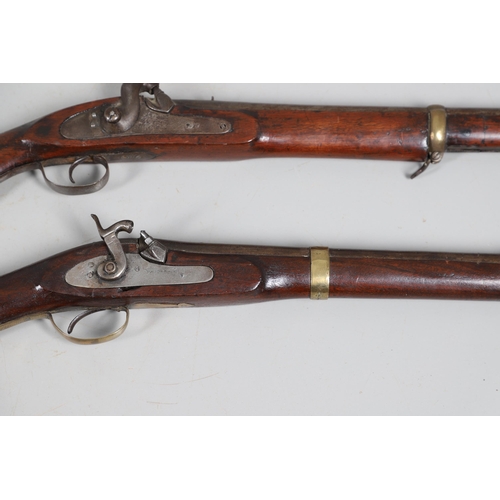 36 - A 19TH CENTURY ENFIELD TYPE PERCUSSION FIRING RIFLE AND ANOTHER SIMILAR. With a 97 cm unmarked barre... 