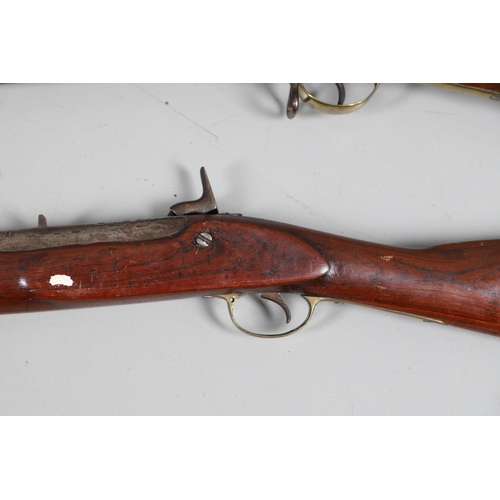 37 - A 19TH CENTURY ENFIELD TYPE PERCUSSION FIRING RIFLE AND ANOTHER SIMILAR. With an 80 cm unmarked barr... 