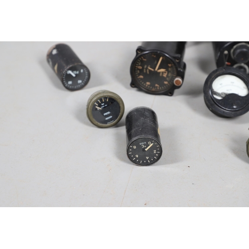 A COLLECTION OF AVIATION DIALS TO INCLUDE AUTOMATIC PILOT, TANK GAUGES ...