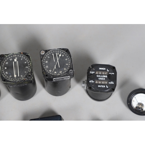 A COLLECTION OF AVIATION DIALS TO INCLUDE AUTOMATIC PILOT, TANK GAUGES ...