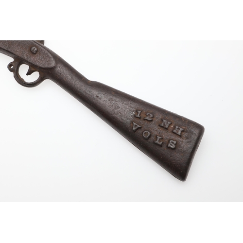 40 - AN AMERICAN CAST IRON MINIATURE RIFLE MARKED FOR THE '12 N H VOLS'. A cast Iron miniature rifle mark... 