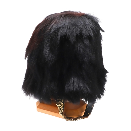 407 - A BRIGADE OF GUARDS OTHER RANKS BEARSKIN HAT. An Other Ranks Bearskin Cap with traditional wicker fr... 