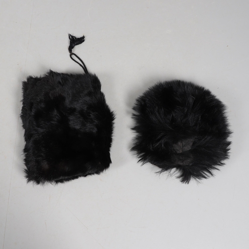 408 - A UNIFORM BEARSKIN COVER AND A SIMILAR MUFF. A unifrom bearskin cover and a similar muff.