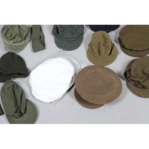 409 - AN EXTENSIVE COLLECTION OF MILITARY UNIFORM CAPS, BERETS AND OTHER ITEMS. SECOND WORLD WAR AND LATER... 