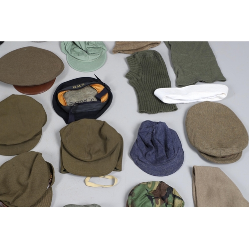 409 - AN EXTENSIVE COLLECTION OF MILITARY UNIFORM CAPS, BERETS AND OTHER ITEMS. SECOND WORLD WAR AND LATER... 