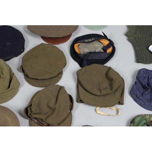 409 - AN EXTENSIVE COLLECTION OF MILITARY UNIFORM CAPS, BERETS AND OTHER ITEMS. SECOND WORLD WAR AND LATER... 