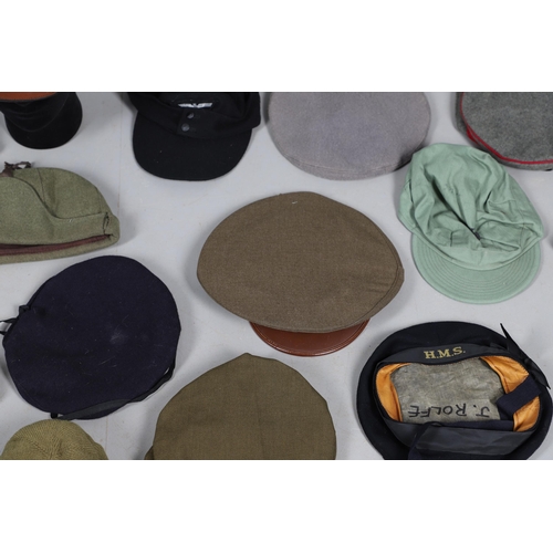 409 - AN EXTENSIVE COLLECTION OF MILITARY UNIFORM CAPS, BERETS AND OTHER ITEMS. SECOND WORLD WAR AND LATER... 