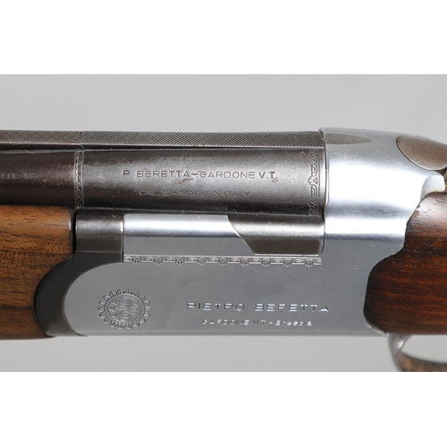 41 - A BERETTA 12 BORE SHOTGUN. A 12 bore shotgun by Pietro Beretta of Italy with 71 cm over and under ba... 