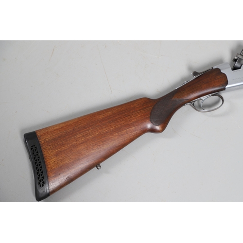 41 - A BERETTA 12 BORE SHOTGUN. A 12 bore shotgun by Pietro Beretta of Italy with 71 cm over and under ba... 