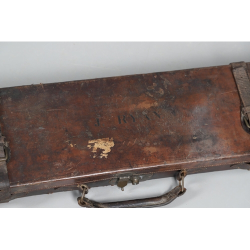 42 - A LEATHER GUN CASE WITH LABEL FOR WILLIAM POWELL AND SONS. A leather gun case, the interior fitted f... 