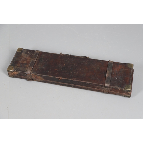 42 - A LEATHER GUN CASE WITH LABEL FOR WILLIAM POWELL AND SONS. A leather gun case, the interior fitted f... 