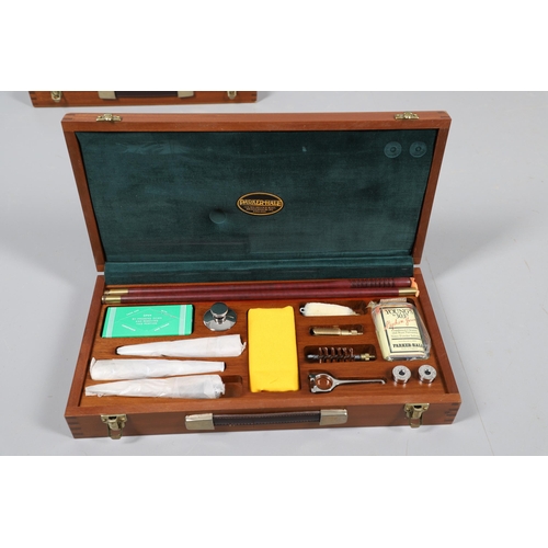 44 - A COLLECTION OF FIVE GUN CLEANING KITS BY PARKER HALE. A selection of gun cleaning kits containing a... 