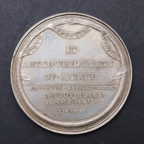 457 - AN AWARD MEDAL FOR THE ACADEMY OF ANCIENT MUSIC, 1750. An Academy of Ancient music award medal, obve... 