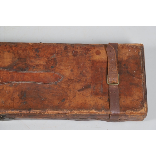 46 - A LEATHER TRAVELLING CASE FOR A SHOTGUN. A leather gun case with label for Boss & Co, London. Case 8... 