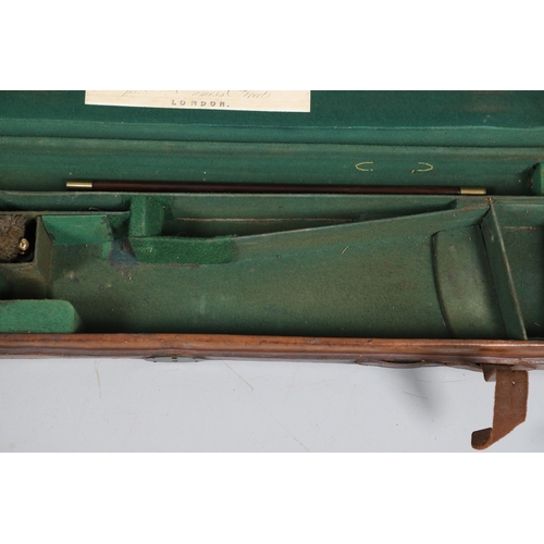 46 - A LEATHER TRAVELLING CASE FOR A SHOTGUN. A leather gun case with label for Boss & Co, London. Case 8... 