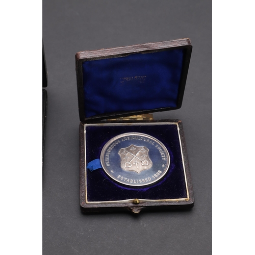 470 - TWO AGRICULTURAL AWARD MEDALS BY THOMAS OTTLEY. An agricultural award medal with a standing shire ho... 