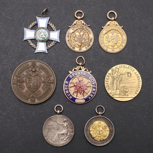 472 - A COLLECTION OF GOLD AND SILVER SPORTING MEDALS TO INCLUDE A 1920'S OLYMPIC TRIALS MEDAL. A London A... 