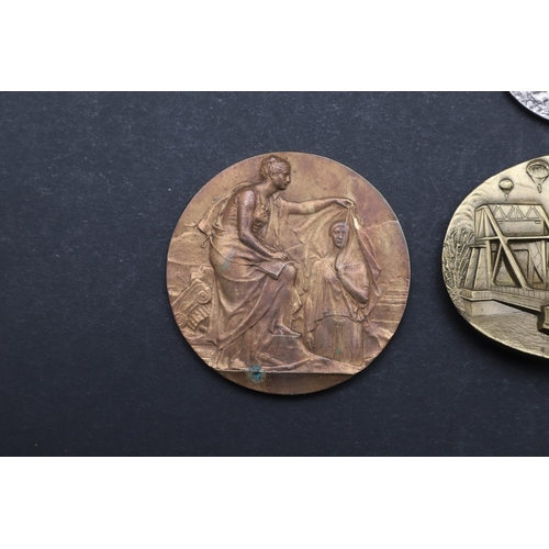 474 - AN HISTORIC MEDAL COMMEMORATING THE BIRTH OF KAISER WILHELM II, AND THREE OTHERS. A bronze medal cel... 