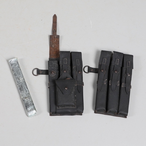 50 - TWO SECOND WORLD WAR GERMAN MACHINE GUN MAGAZINE POUCHES AND MAGAZINES. Two black leather magazine p... 