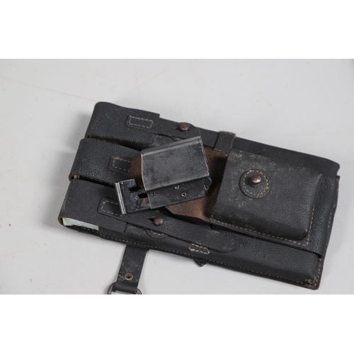 50 - TWO SECOND WORLD WAR GERMAN MACHINE GUN MAGAZINE POUCHES AND MAGAZINES. Two black leather magazine p... 