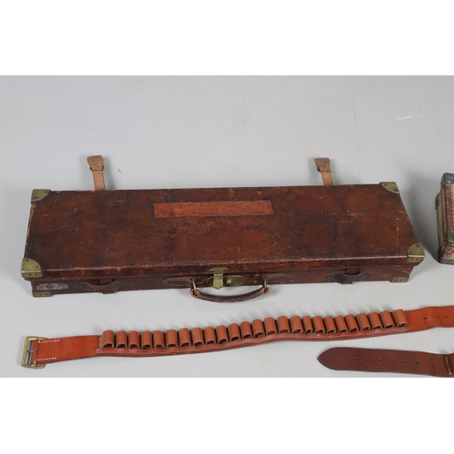 52 - A LEATHER SHOTGUN CASE AND OTHER GUN CASES. A leather shotgun case with fitted interior, twin straps... 