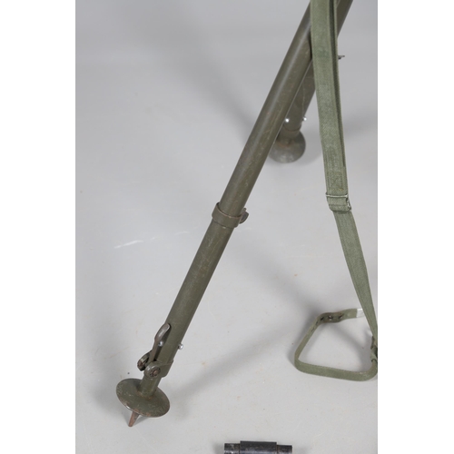 54 - A MILITARY MACHINE GUN TRIPOD AND A COLLECTION OF SMALLER BARREL SUPPORTS. A large three legged khak... 