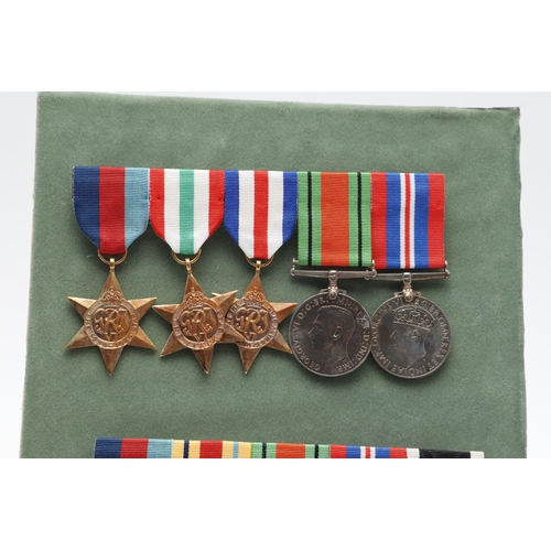 555 - THREE BARS OF SECOND WORLD WAR MEDALS TO INCLUDE A NEW ZEALAND WAR SERVICE GROUP. A group of five co... 