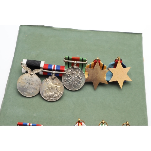 555 - THREE BARS OF SECOND WORLD WAR MEDALS TO INCLUDE A NEW ZEALAND WAR SERVICE GROUP. A group of five co... 