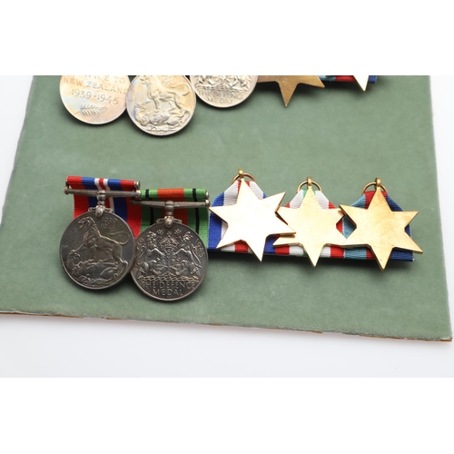 555 - THREE BARS OF SECOND WORLD WAR MEDALS TO INCLUDE A NEW ZEALAND WAR SERVICE GROUP. A group of five co... 