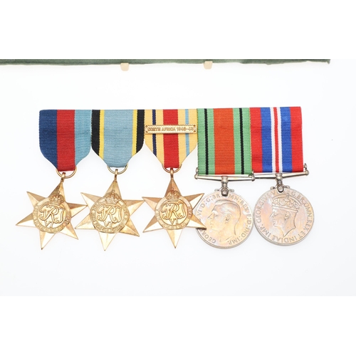 555 - THREE BARS OF SECOND WORLD WAR MEDALS TO INCLUDE A NEW ZEALAND WAR SERVICE GROUP. A group of five co... 