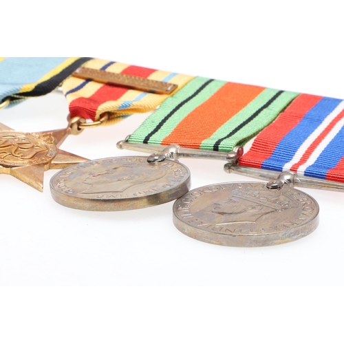 555 - THREE BARS OF SECOND WORLD WAR MEDALS TO INCLUDE A NEW ZEALAND WAR SERVICE GROUP. A group of five co... 