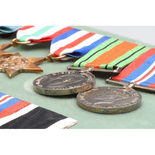 555 - THREE BARS OF SECOND WORLD WAR MEDALS TO INCLUDE A NEW ZEALAND WAR SERVICE GROUP. A group of five co... 