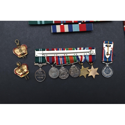 558 - A TERRITORIAL EFFICIENCY MEDAL, A SET OF MINIATURES AND RIBBON BARS. An Elizabeth II Territorial Eff... 