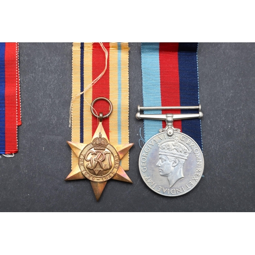 562 - A COLLECTION OF MEDALS TO THE HOGG FAMILY AND OTHERS TO INCLUDE AN MBE GROUP OF FOUR. A group of fou... 