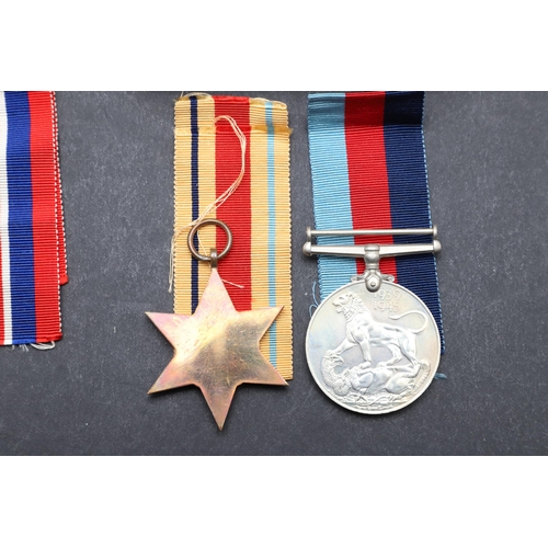 562 - A COLLECTION OF MEDALS TO THE HOGG FAMILY AND OTHERS TO INCLUDE AN MBE GROUP OF FOUR. A group of fou... 