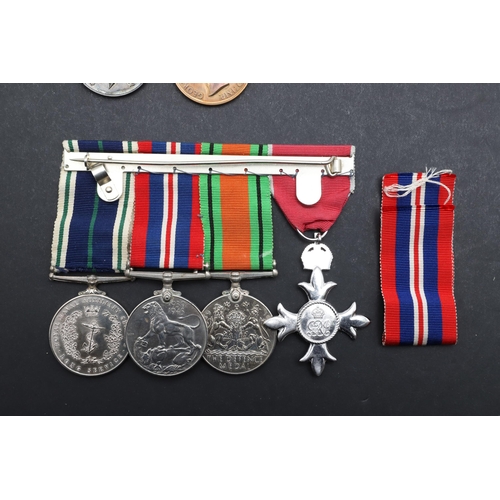 562 - A COLLECTION OF MEDALS TO THE HOGG FAMILY AND OTHERS TO INCLUDE AN MBE GROUP OF FOUR. A group of fou... 