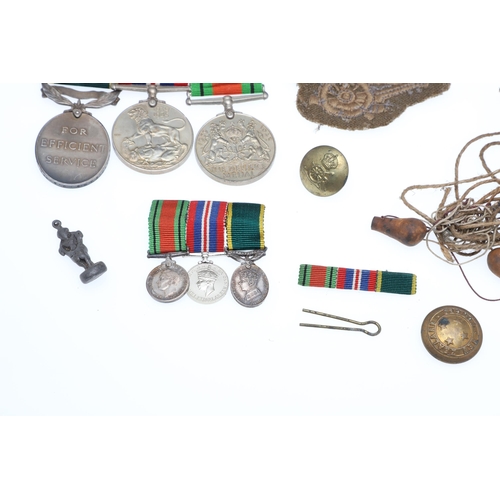 563 - A SECOND WORLD WAR TERRITORIAL TRIO, MINIATURES AND SUPPORTING ITEMS. A Second World War Trio compri... 