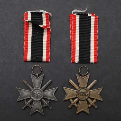 573 - TWO SECOND WORLD WAR GERMAN WAR SERVICE CROSSES. Two German War Service Crosses, 2nd Class with swor... 