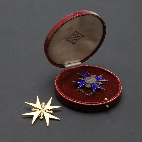 579 - THE BADGE OF THE FLORENCE NIGHTINGALE SCHOOL OF NURSING. An eight pointed star with dark blue enamel... 