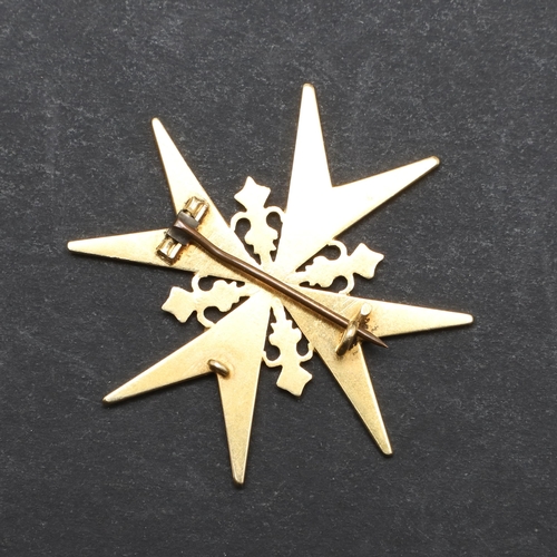 579 - THE BADGE OF THE FLORENCE NIGHTINGALE SCHOOL OF NURSING. An eight pointed star with dark blue enamel... 